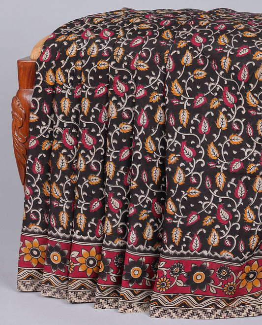 Black floral vine machine-printed kalamkari cotton saree, contrast floral & chevron border & pallu of floral & paisleys