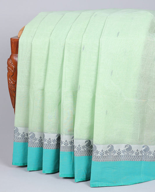 Green cotton saree with all-over buttas, contrast paisley design border & pallu of stripes 
