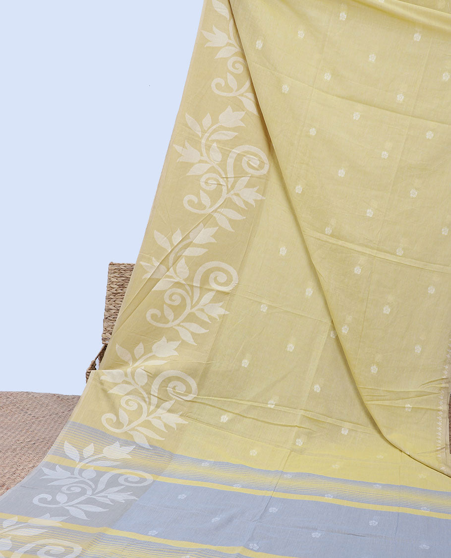 Light yellow khadi cotton saree with floral buttas, floral design border & pallu of stripes
