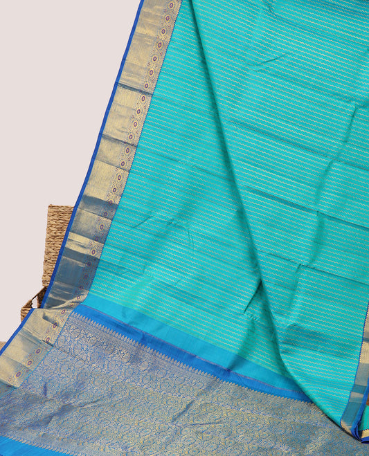 Blue neli striped silksaree,contrast floral jaal pallu & zari border of rekku,muthu,zari stripes & meenakari kodi visiry