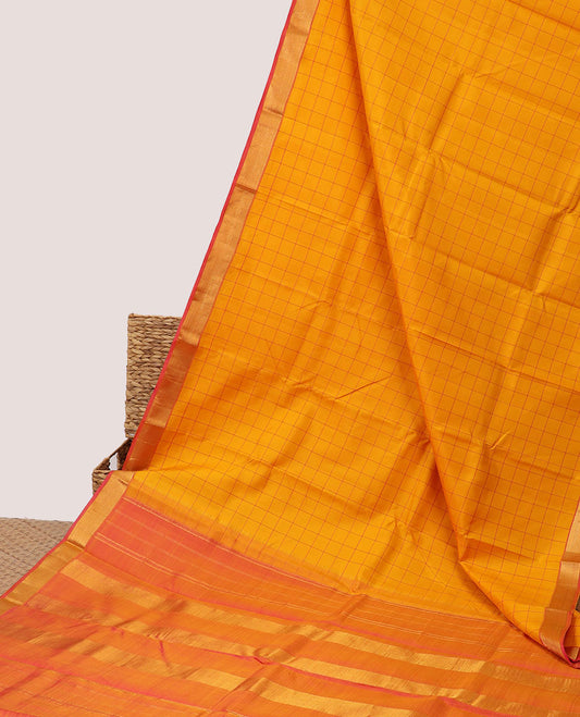 Orange checked silk saree, contrast zari border of muthu & vanki designs & pallu of zari designs
