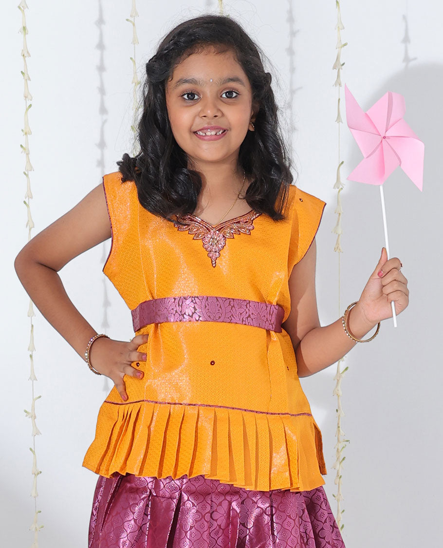 Purple jacquard readymade art silk pavadai with zari design border & contrast embroidery sleeveless blouse