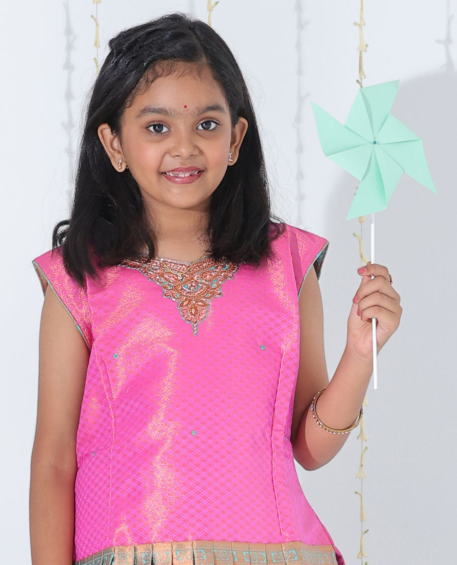 Turquoise jacquard readymade art silk pavadai with zari design border & contrast embroidery sleeveless blouse