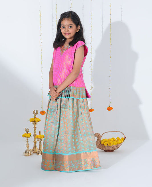 Turquoise jacquard readymade art silk pavadai with zari design border & contrast embroidery sleeveless blouse
