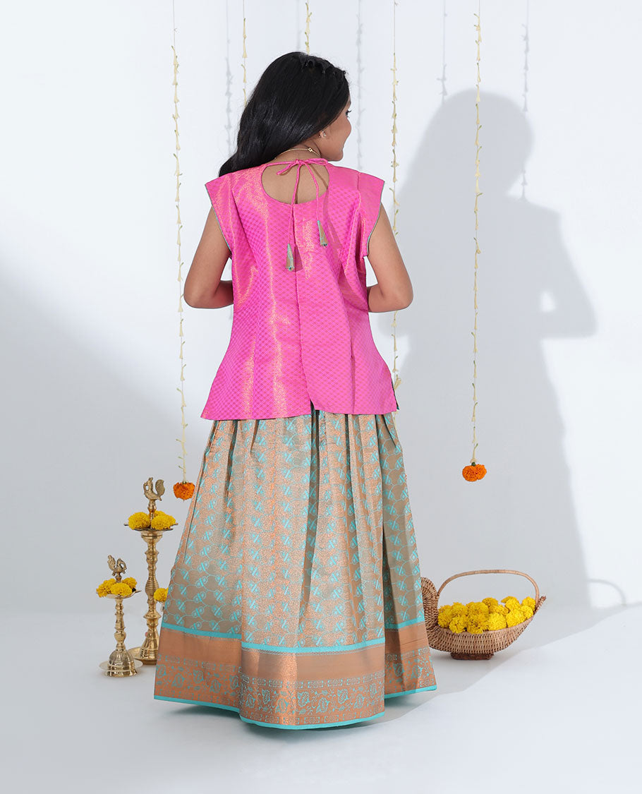 Turquoise jacquard readymade art silk pavadai with zari design border & contrast embroidery sleeveless blouse