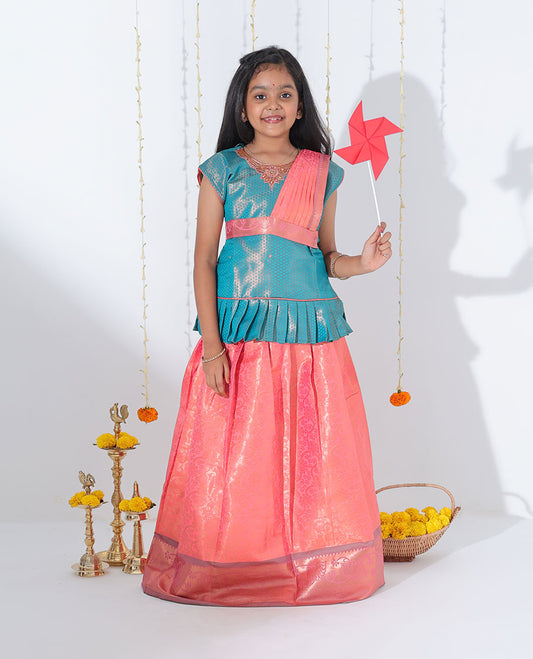 Pink jacquard readymade art silk pavadai with contrast traditional zari design border & embroidery sleeveless blouse