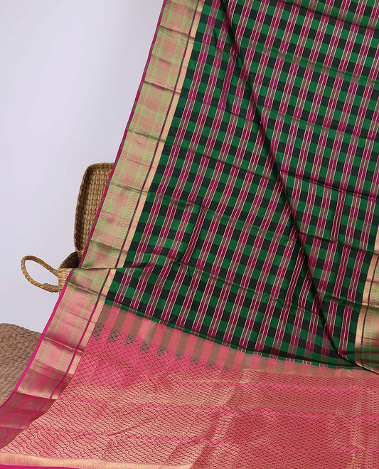 Green zari checked design silksaree, contrast jaal pallu & zari border of rekku,kuyil kann & jaal design