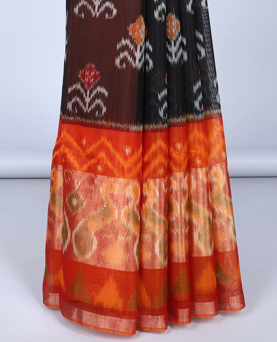 Black ikkat floral motifs silk cotton saree, contrast peacock & geometric border & pallu of ikkat argyle designs