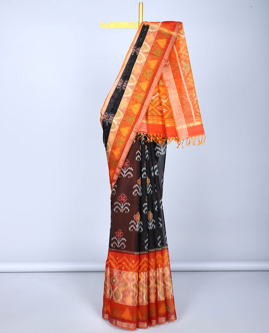 Black ikkat floral motifs silk cotton saree, contrast peacock & geometric border & pallu of ikkat argyle designs