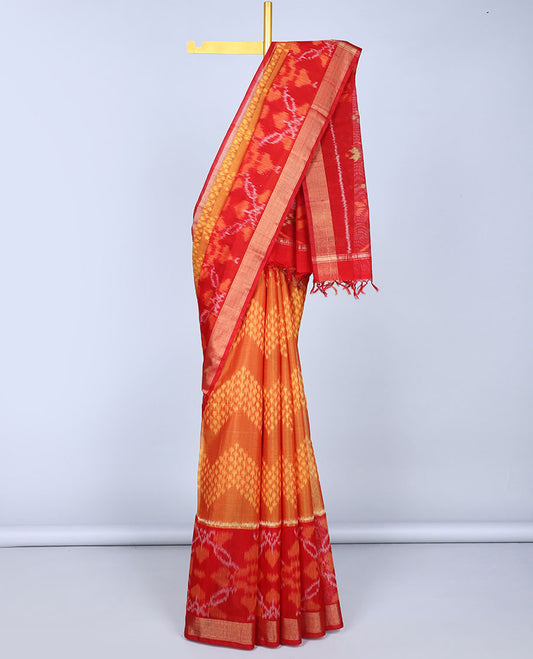 Orange ikkat chevron design silk cotton saree, contrast ikkat floral vine border & pallu of floral ikkat designs