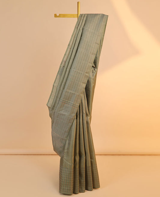 Green jacquard Vasundhara 3D silk saree, intricate pallu & zari border of stripe designs