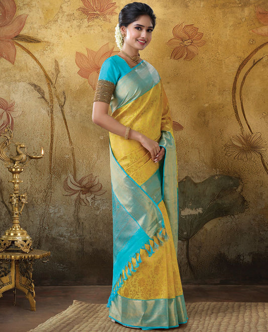 Yellow jacquard kanchipuram silk saree, contrast traditional design zari border & intricate pallu