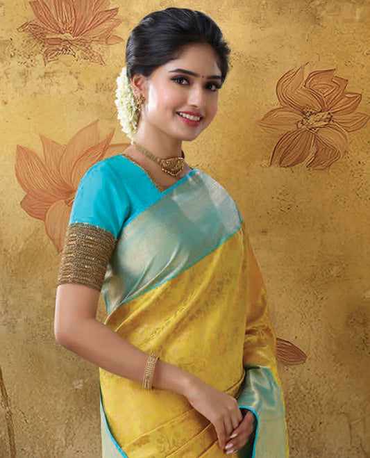 Yellow jacquard kanchipuram silk saree, contrast traditional design zari border & intricate pallu
