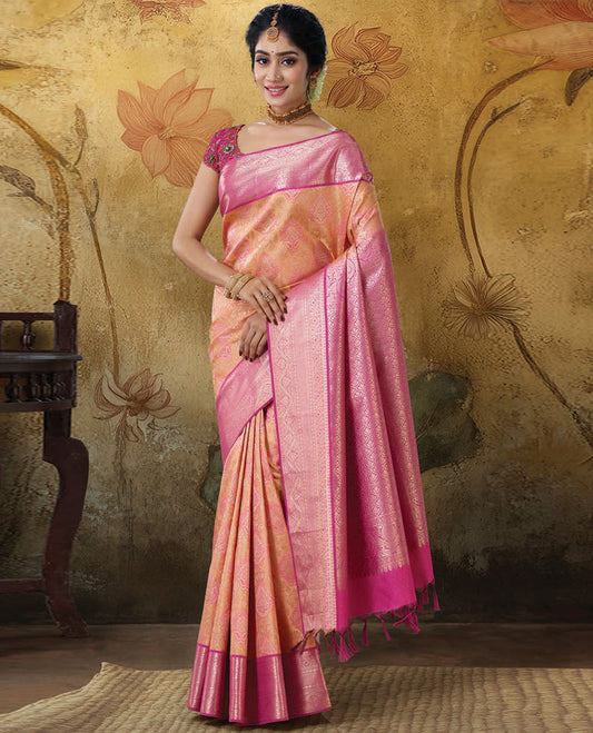 Orange jacquard Kanchipuram wedding silksaree, contrast ogee patterned pallu & border of traditional designs 