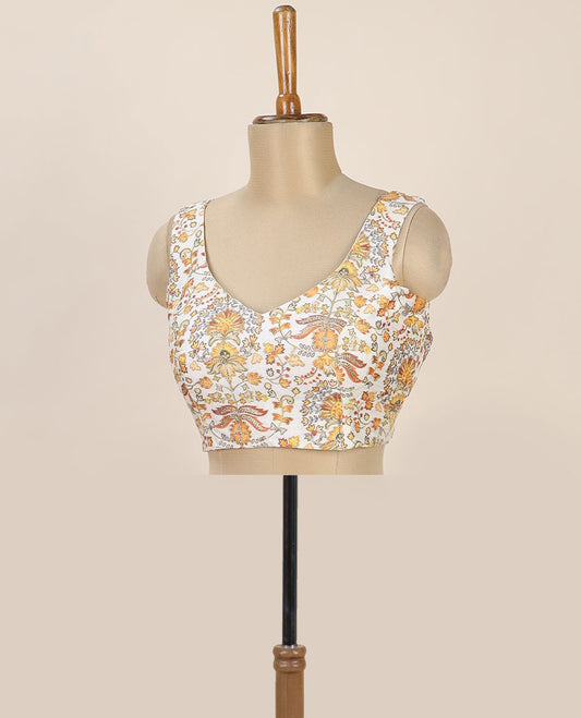 Cream intricate floral printed with thread embroidered front and back leaf-neck sleeveless readymade blouse