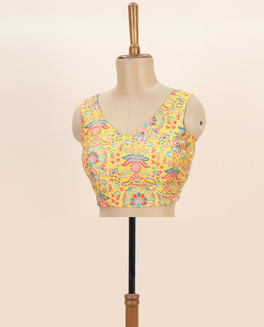 Yellow intricate floral printed with thread embroidered front and back leaf-neck sleeveless readymade blouse