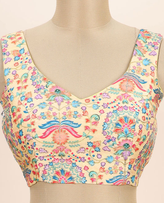 Pale yellow intricate floral printed with thread embroidered front and back leaf-neck sleeveless readymade blouse