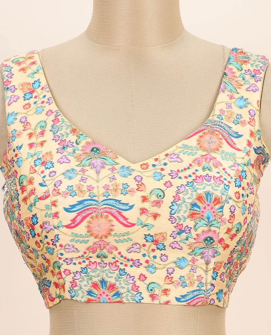 Pale yellow intricate floral printed with thread embroidered front and back leaf-neck sleeveless readymade blouse