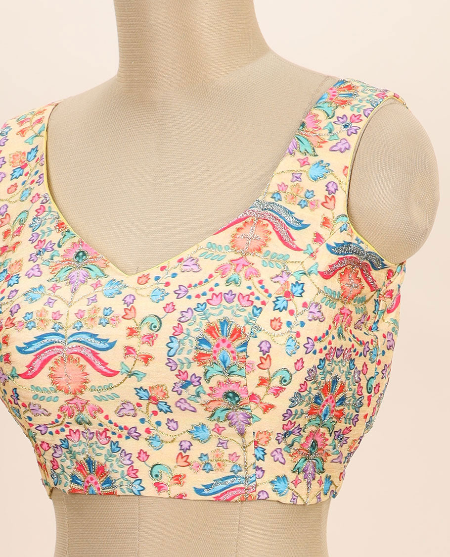 Pale yellow intricate floral printed with thread embroidered front and back leaf-neck sleeveless readymade blouse