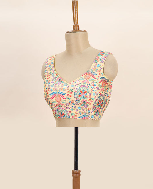 Pale yellow intricate floral printed with thread embroidered front and back leaf-neck sleeveless readymade blouse