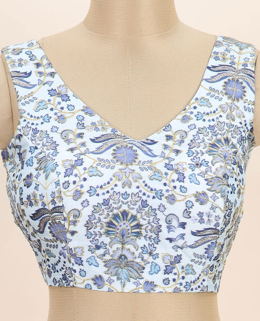 White intricate floral printed with thread embroidered front and back v-neck sleeveless readymade blouse