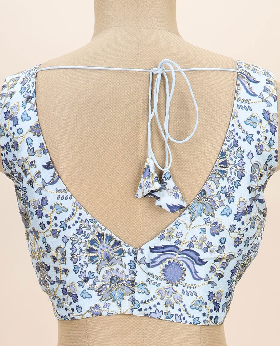 White intricate floral printed with thread embroidered front and back v-neck sleeveless readymade blouse