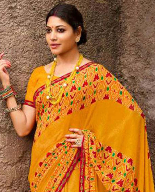 Orange intricately ikkat printed casual wear saree, lace border