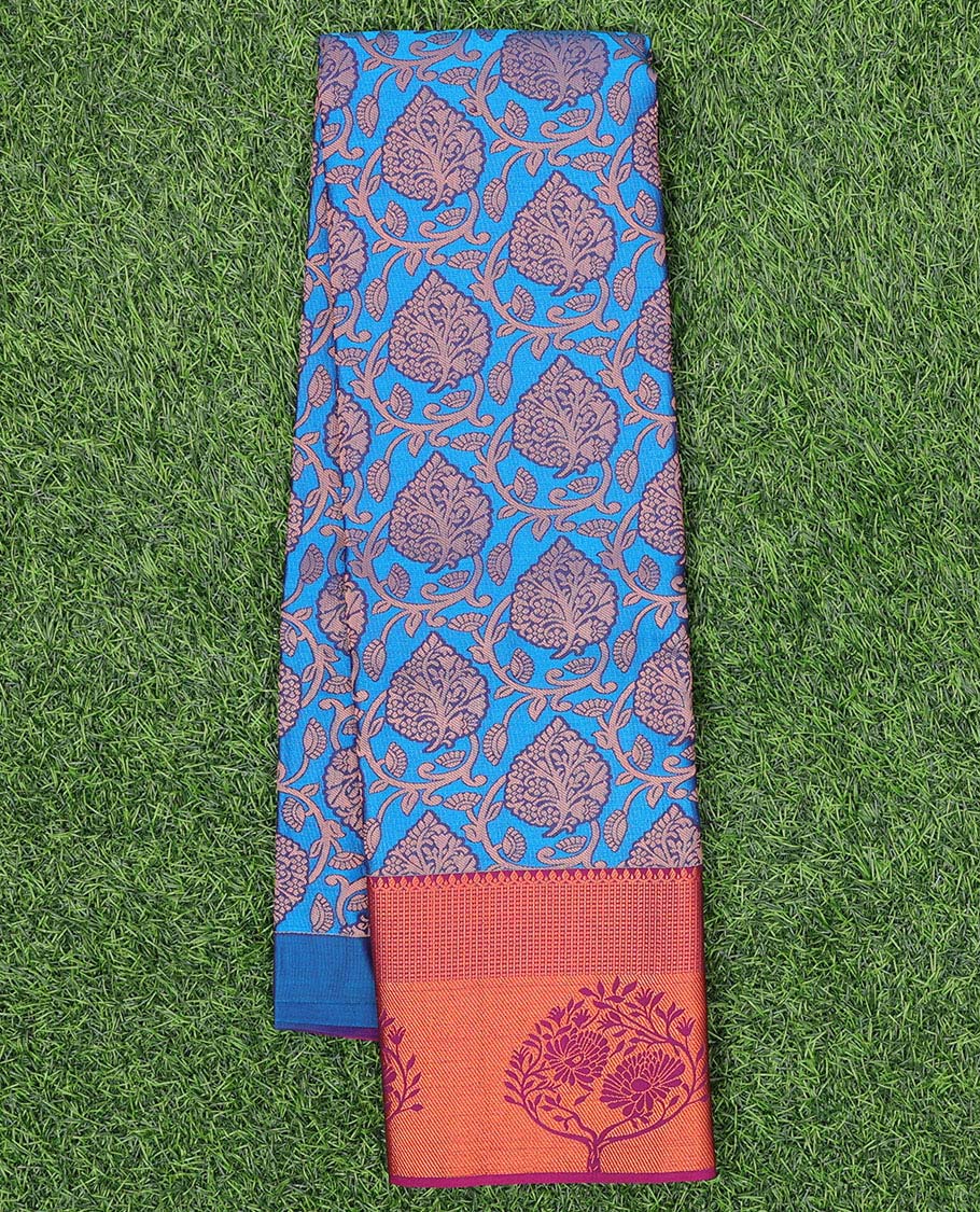 Blue jacquard art silk pavadai, contrast blouse & border of traditional zari designs