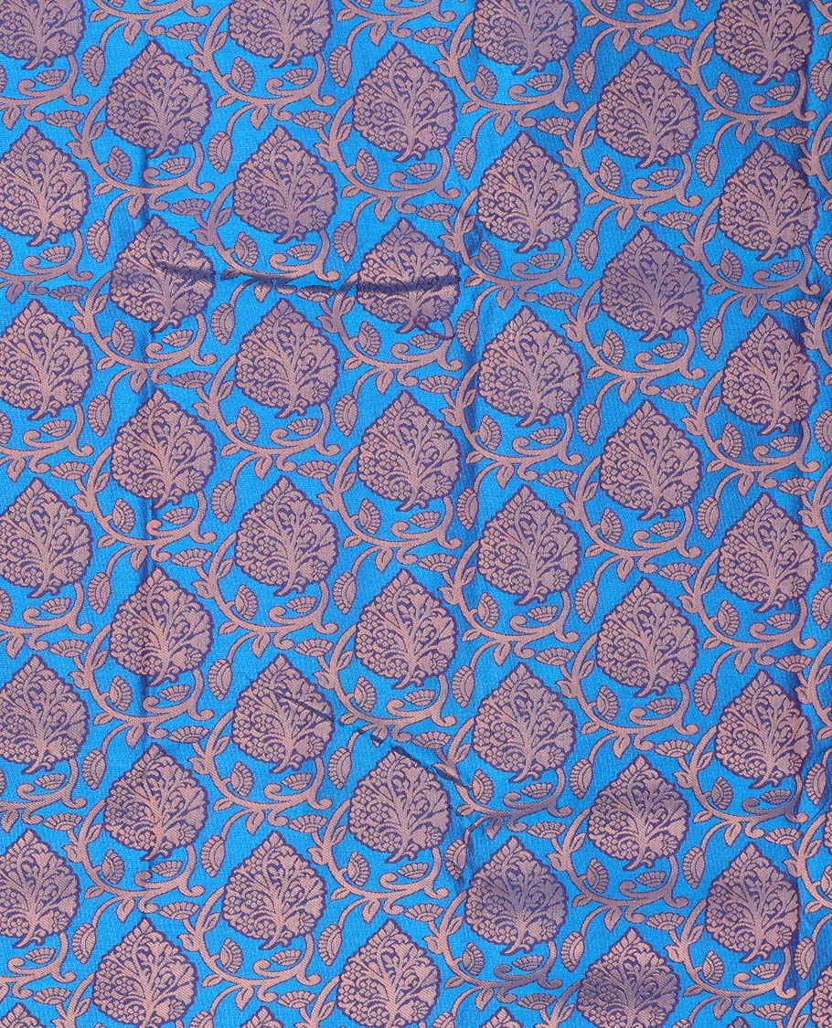 Blue jacquard art silk pavadai, contrast blouse & border of traditional zari designs