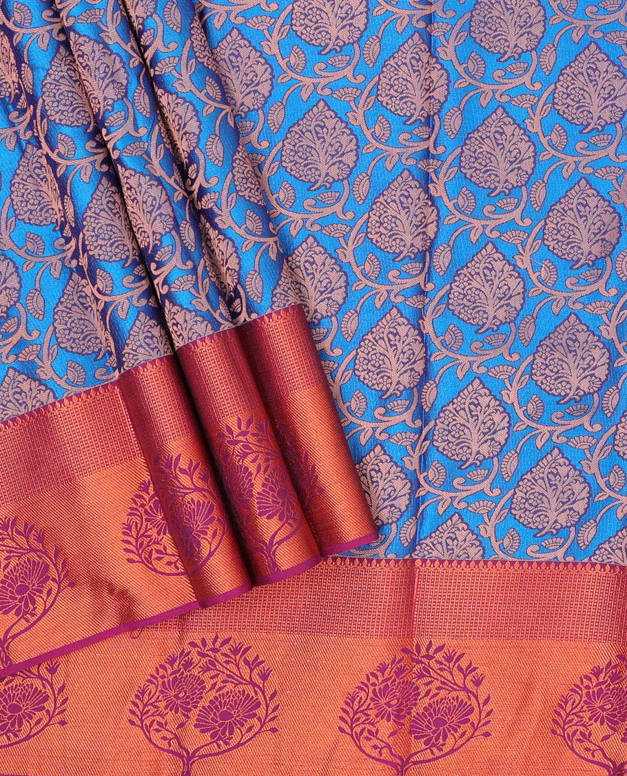 Blue jacquard art silk pavadai, contrast blouse & border of traditional zari designs