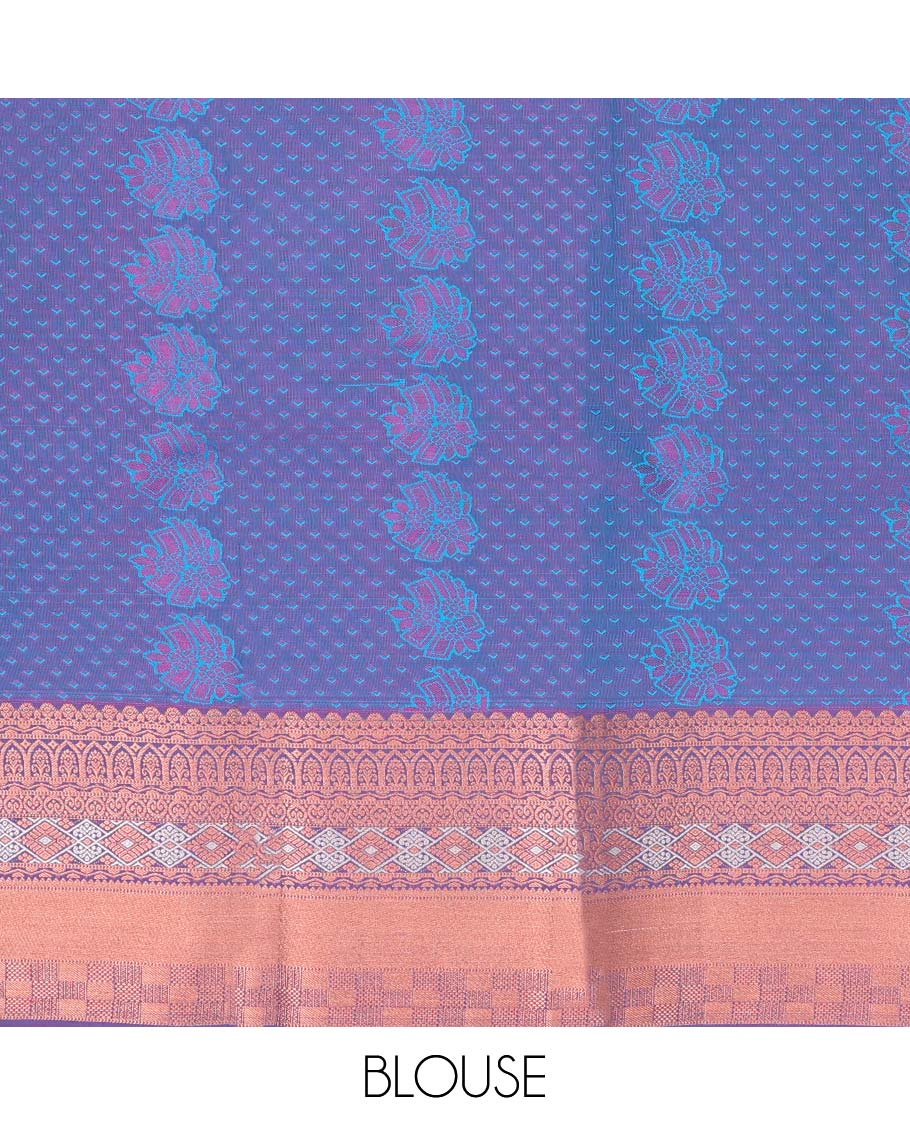 Blue embossed art silk pavadai with buttas, contrast blouse & border of traditional zari designs
