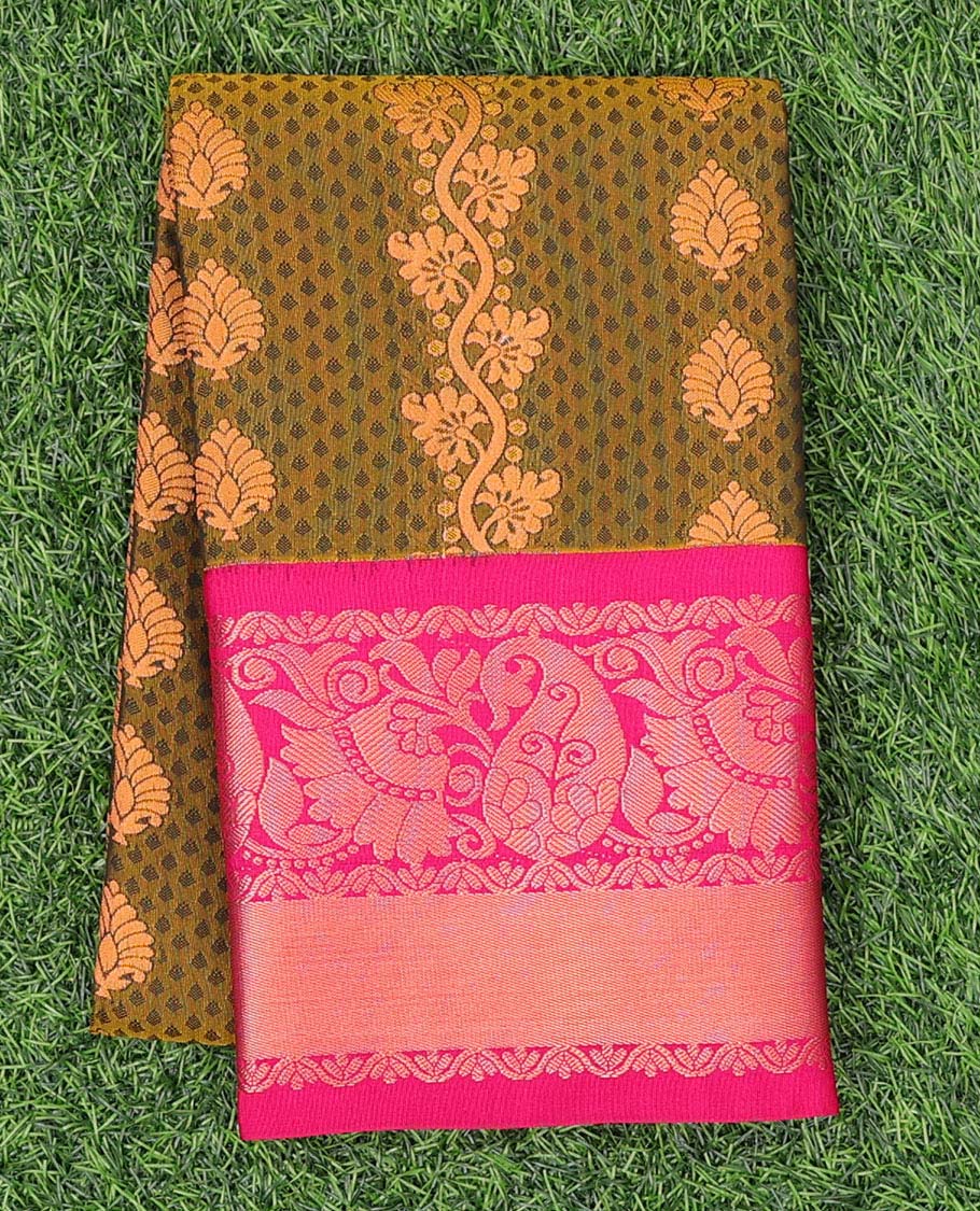 Green embossed art silk pavadai with buttas, contrast blouse & border of traditional zari designs