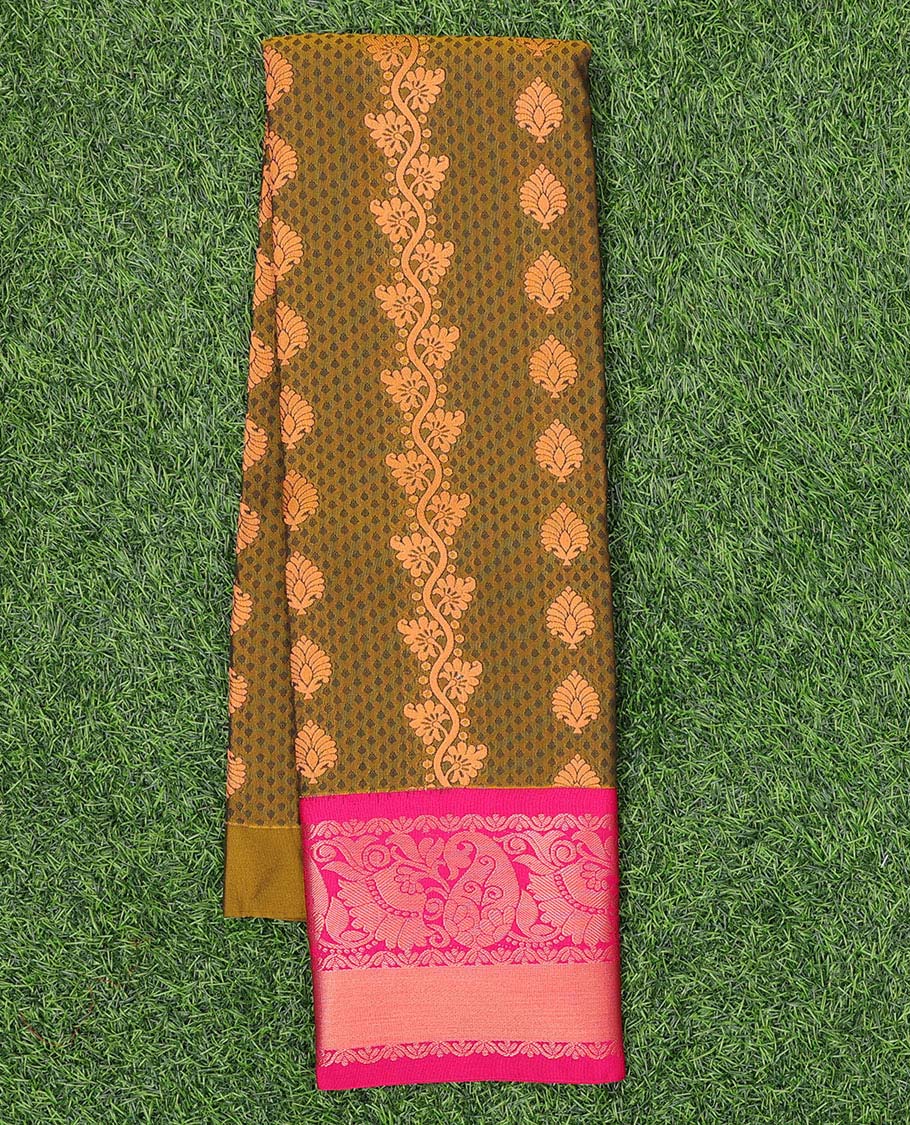 Green embossed art silk pavadai with buttas, contrast blouse & border of traditional zari designs