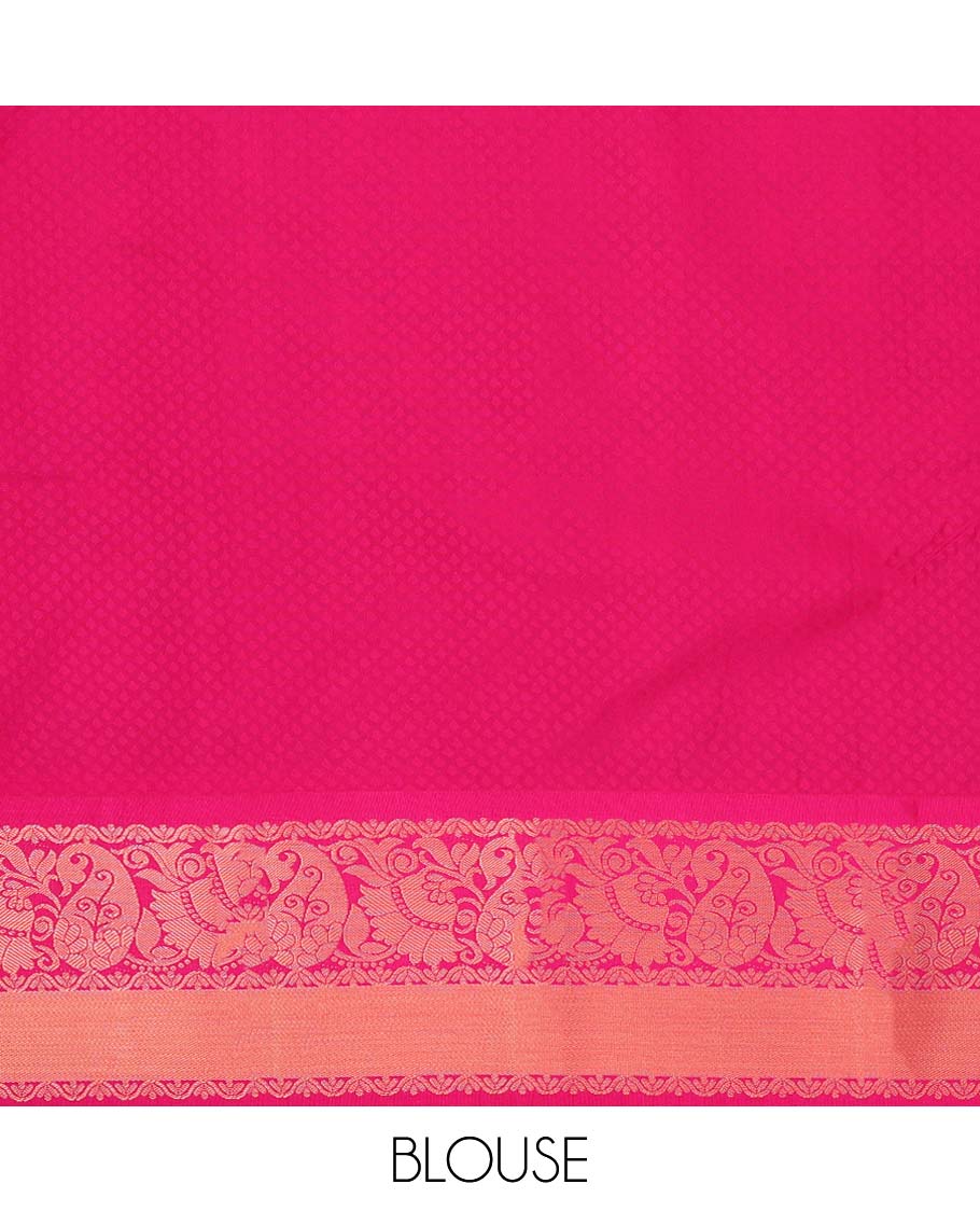 Green embossed art silk pavadai with buttas, contrast blouse & border of traditional zari designs