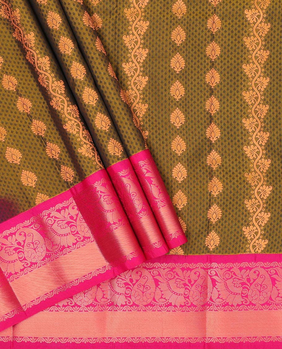 Green embossed art silk pavadai with buttas, contrast blouse & border of traditional zari designs