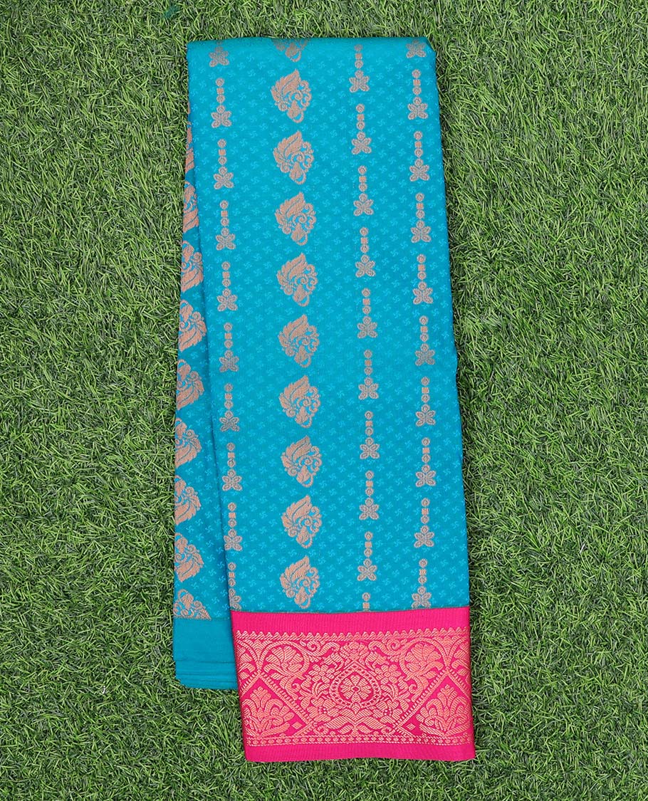 Blue embossed art-silk pavadai with zari buttes, contrast blouse & border of traditional designs