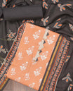 Orange chudidhar material set, floral buttas top, contrast plain bottom & dupatta of floral motifs