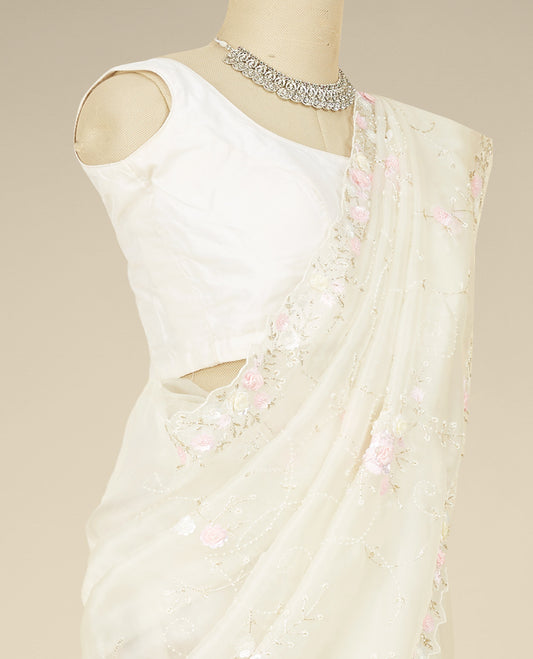 Cream floral vine embroidered organza saree, scallop floral vine embroidered border