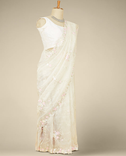 Cream floral vine embroidered organza saree, scallop floral vine embroidered border