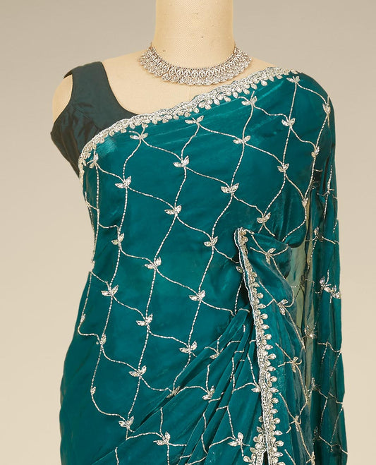 Green ogee pattern embroidered Jimmy choo designer saree, scallop stone embroidered border