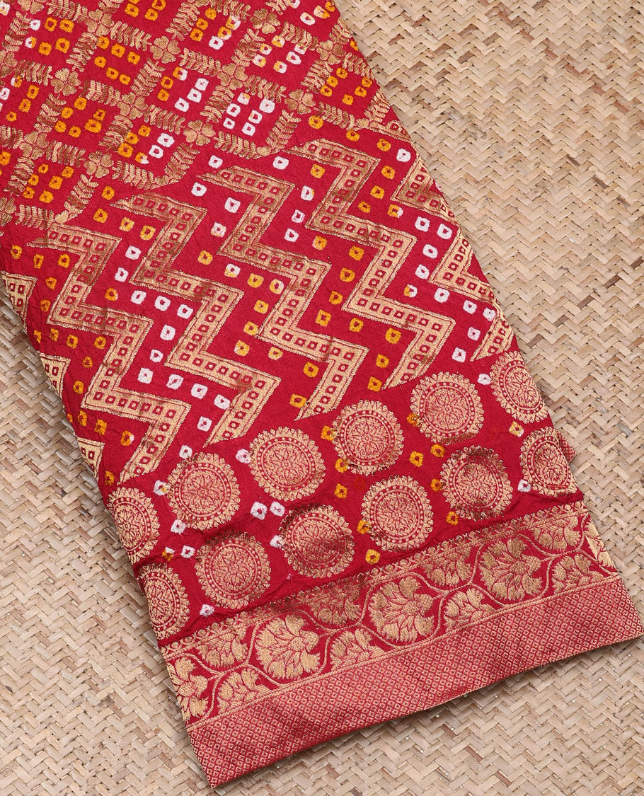 Red jaal design bandhani saree with bandhani dots, traditional design border & pallu of intricate designs