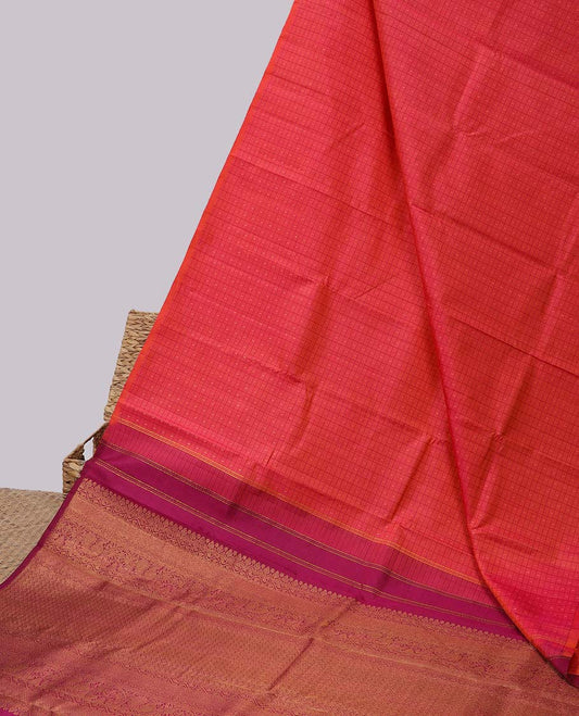 Borderless pink butta enclosed checked kancheepuram silksaree, contrast pallu of traditional designs in zari