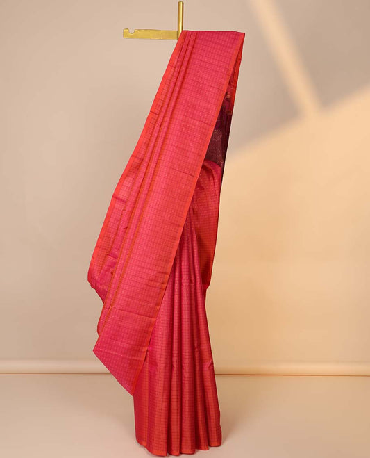 Borderless pink butta enclosed checked kancheepuram silksaree, contrast pallu of traditional designs in zari