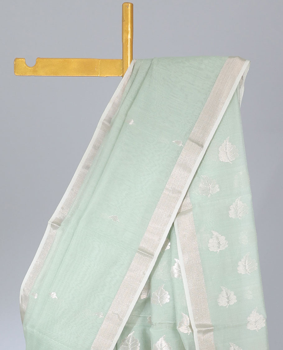 Green chanderi cotton saree with zari buttas, plain border & pallu of leaf designs