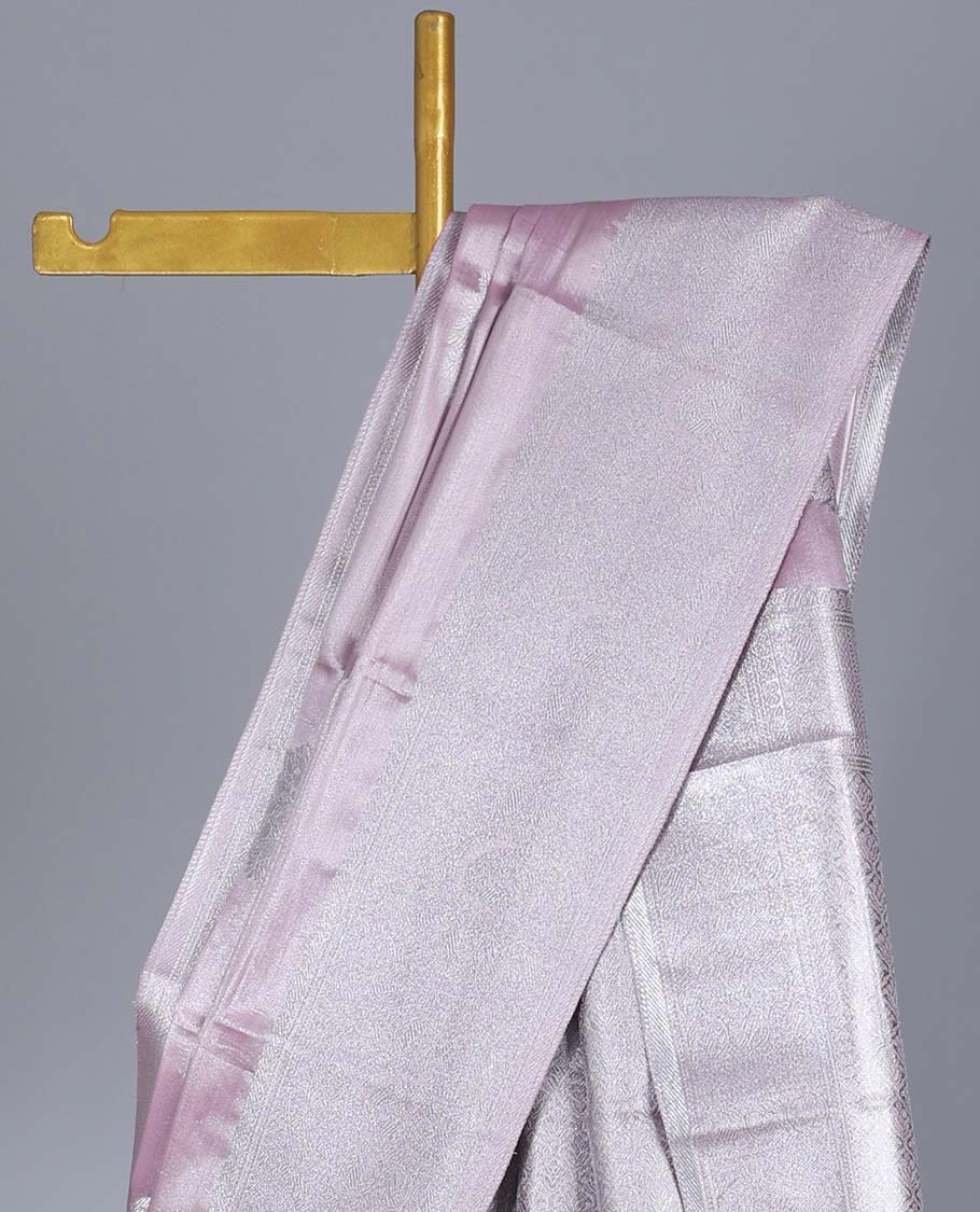 Pink tissue saree with peacock buttas, traditional zari design border & pallu of intricate designs