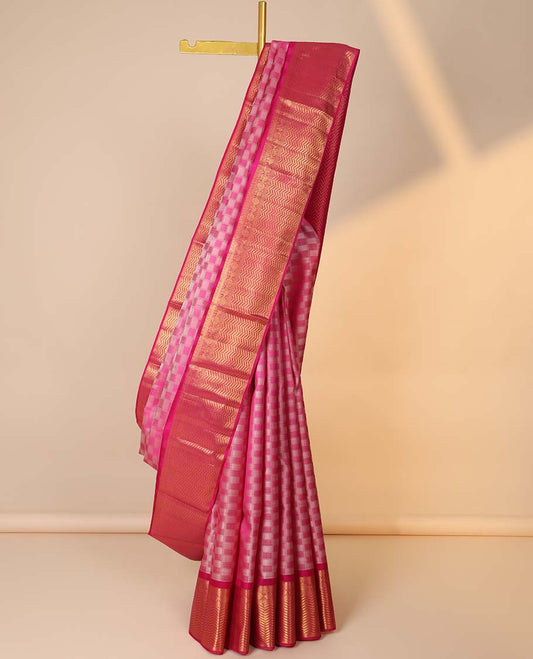 Pink checked silk saree, contrast vanki pallu & zari border of thilakam,banaras,diamond,mayil chakram & vanki