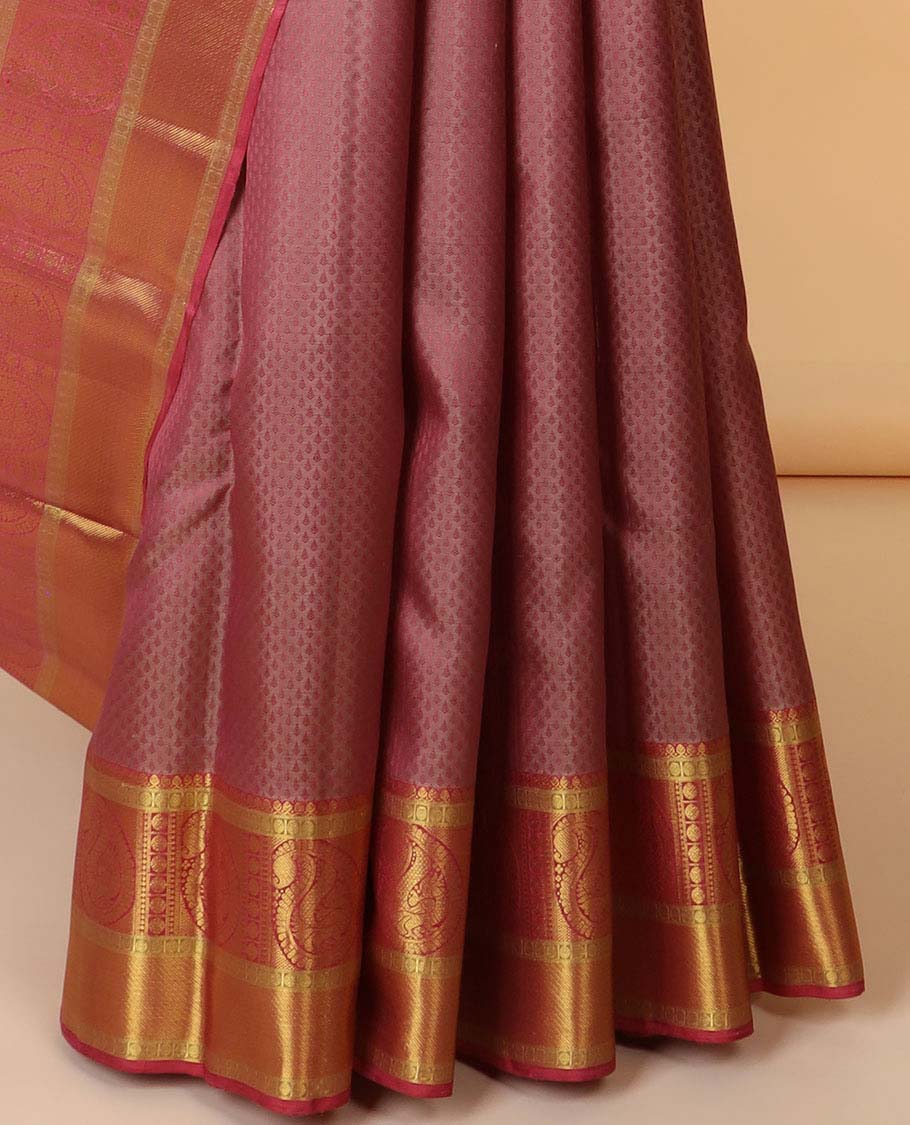 Pink embossed silk saree, contrast jaal pallu & zari border of thilakam mokku,poun,arumbu manga,mayil & zari stripes