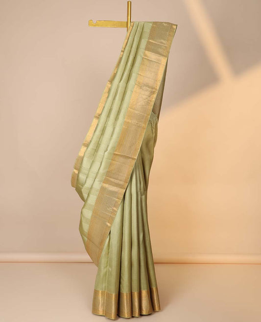 Green striped silksaree, vanki pallu & zari border of thilakam mokku,muthu,kodi visiry & ara maadam design