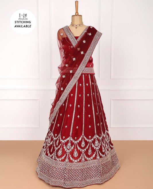 Maroon net lehenga with intricately embroidered skirt, embroidered top & embroidered border net dupatta