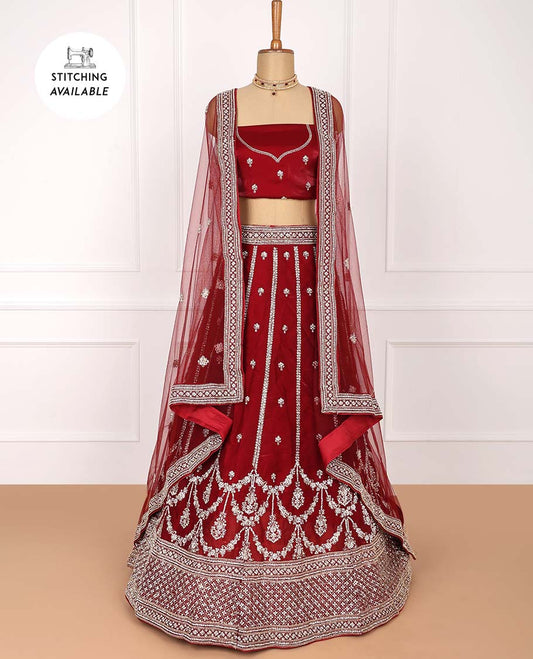 Maroon net lehenga with intricately embroidered skirt, embroidered top & embroidered border net dupatta
